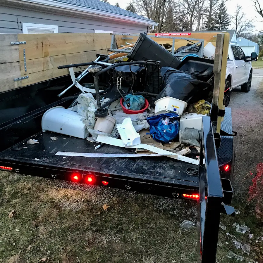 Roll-off dumpster delivered to a residential driveway in Coolidge